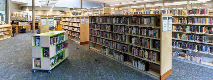 Library bookshelves in the teens and YA sections