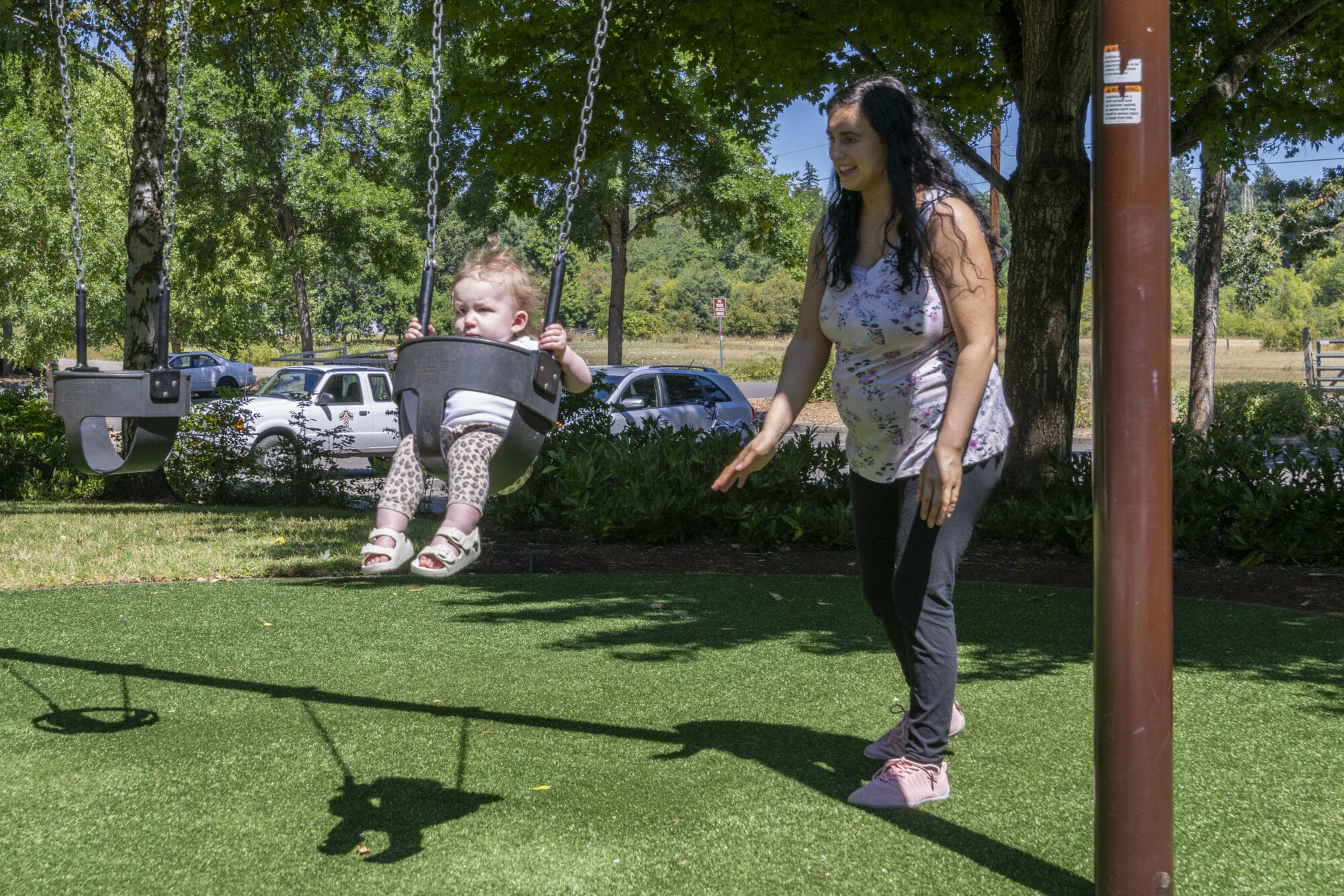 City of Tualatin Jurgens Park mother and child on swing